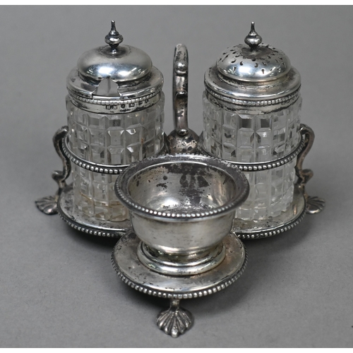 165 - A Victorian silver trefoil cruet stand with two cut glass pots for mustard and pepper, the salt atta... 