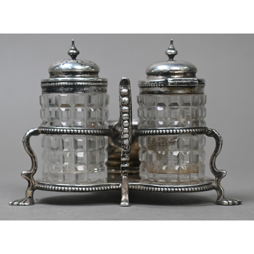 165 - A Victorian silver trefoil cruet stand with two cut glass pots for mustard and pepper, the salt atta... 