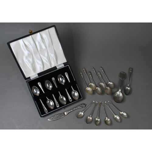 166 - A cased set of six teaspoons and other silver spoons, a butter knife and a Danish sterling preserve ... 