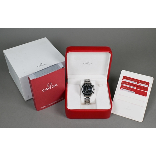 A gents Omega Speedmaster date chronograph automatic wristwatch, the black dial with three sub dials on stainless steel strap, 400mm case, Ser. No. 85894784, in original fitted box c/w papers and cards, circa 2012