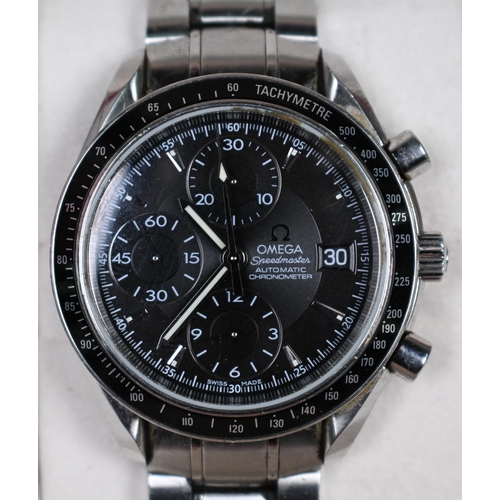 183 - A gents Omega Speedmaster date chronograph automatic wristwatch, the black dial with three sub dials... 