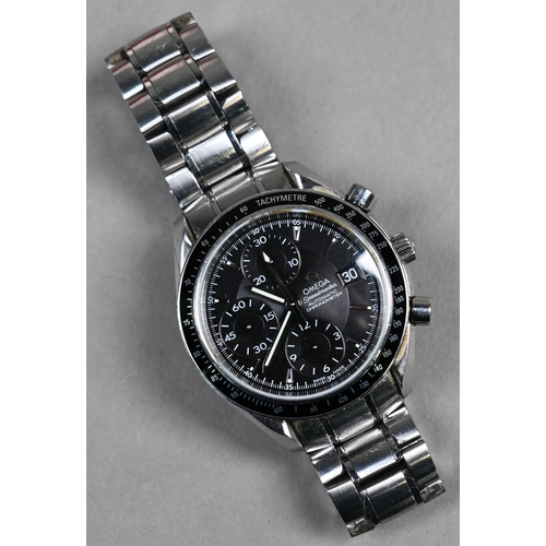 183 - A gents Omega Speedmaster date chronograph automatic wristwatch, the black dial with three sub dials... 