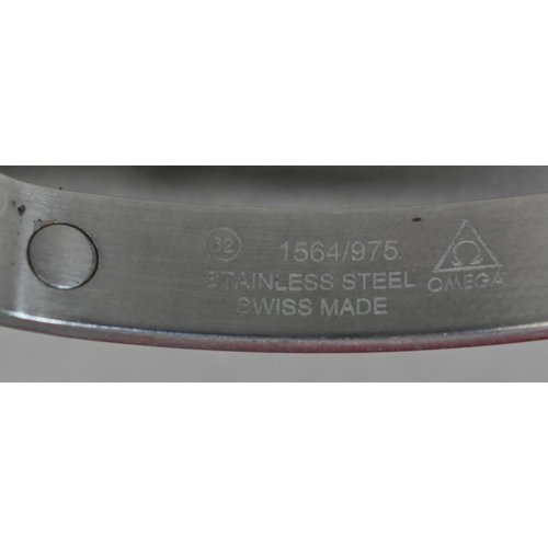 183 - A gents Omega Speedmaster date chronograph automatic wristwatch, the black dial with three sub dials... 