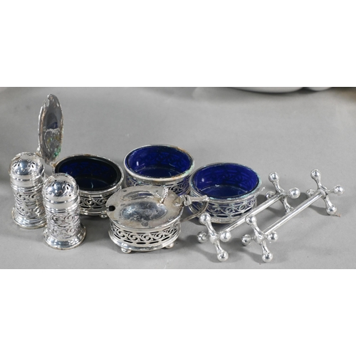 19 - Various silver including brushes, mirror, button hooks etc., to/w a set of four ep chambersticks wit... 