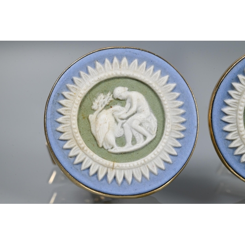 205 - Two pairs of cufflinks, one with Wedgwood jasperware roundels featuring classical vignette, with swi... 