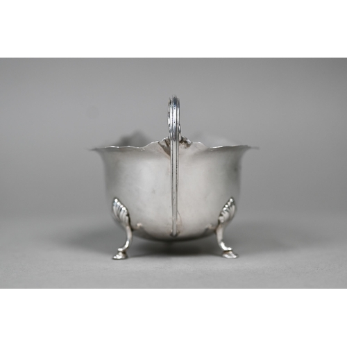 21 - A silver sauce boat on three hoof feet, Birmingham 1924, to/w an egg cup, Birmingham 1959 (2), 3.4oz