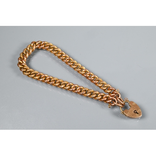 210 - A 9ct rose gold double Albert with two swivels and badge attached, to/w a 9ct curb bracelet with pad... 