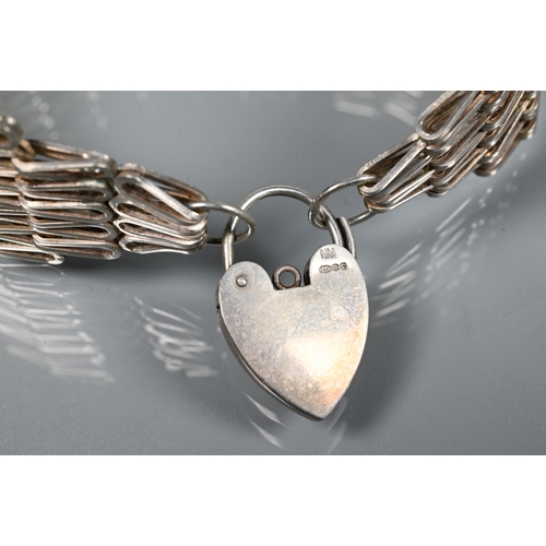 219 - A Victorian silver graduated Albert, four various pairs of silver cufflinks, a silver mesh-link brac... 