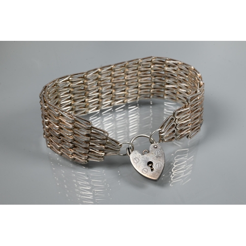 219 - A Victorian silver graduated Albert, four various pairs of silver cufflinks, a silver mesh-link brac... 