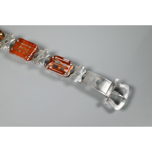 239 - A Victorian silver and agate bracelet in the form of a belt with buckle fastening, 23 cm long