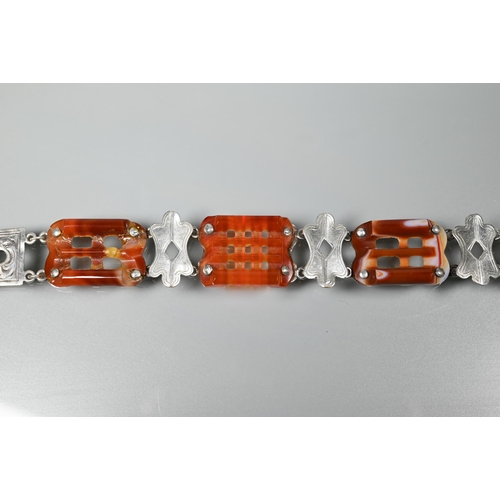 239 - A Victorian silver and agate bracelet in the form of a belt with buckle fastening, 23 cm long
