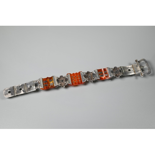 239 - A Victorian silver and agate bracelet in the form of a belt with buckle fastening, 23 cm long