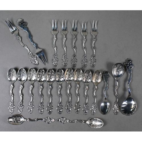 29 - A set of thirteen Norwegian .830 grade teaspoons, seven matching petit fours forks, a sugar spoon an... 