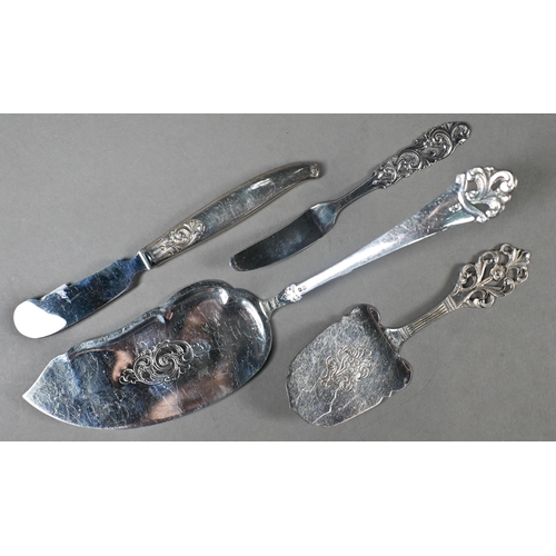 29 - A set of thirteen Norwegian .830 grade teaspoons, seven matching petit fours forks, a sugar spoon an... 