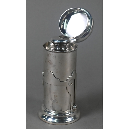 32 - A WW1 silver campaign shaving water-heater with hinged bun cover, rising on brackets to expose spiri... 