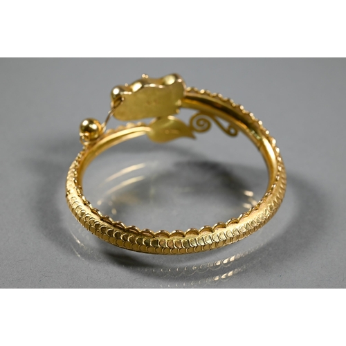 337 - A Chinese yellow gold half-hinged bangle in the form of a coiled dragon chasing the flaming pearl, t... 