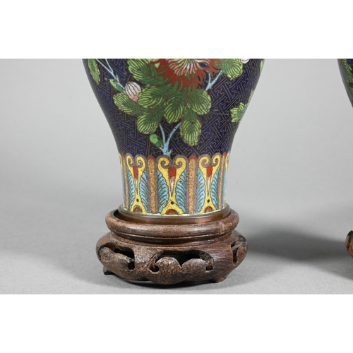 351 - A pair of early-mid 20th century Chinese cloisonne on copper decorated with butterflies and flowers ... 