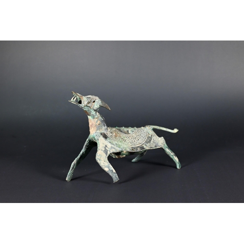 353 - An unusual Chinese bronze dog or mythical beast, possibly a tomb/funerary figure in the Han Dynasty ... 