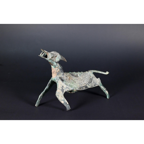 353 - An unusual Chinese bronze dog or mythical beast, possibly a tomb/funerary figure in the Han Dynasty ... 