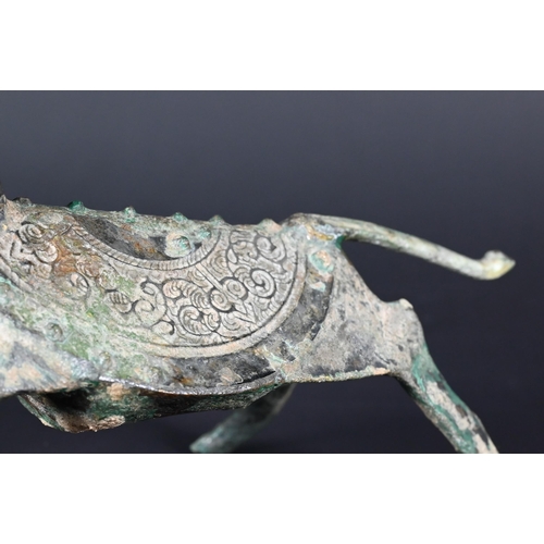 353 - An unusual Chinese bronze dog or mythical beast, possibly a tomb/funerary figure in the Han Dynasty ... 