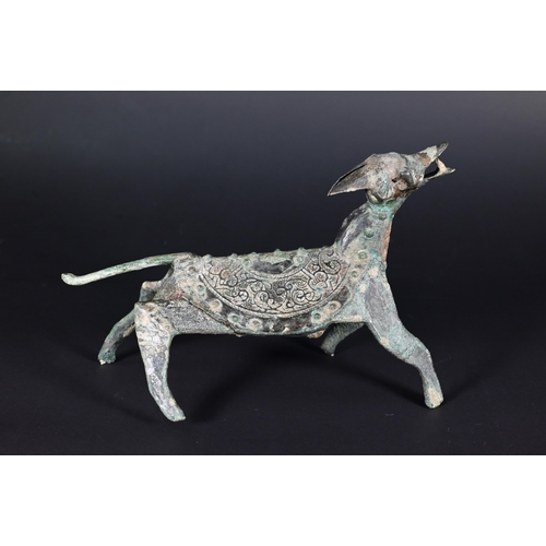 353 - An unusual Chinese bronze dog or mythical beast, possibly a tomb/funerary figure in the Han Dynasty ... 