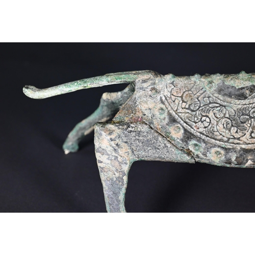 353 - An unusual Chinese bronze dog or mythical beast, possibly a tomb/funerary figure in the Han Dynasty ... 