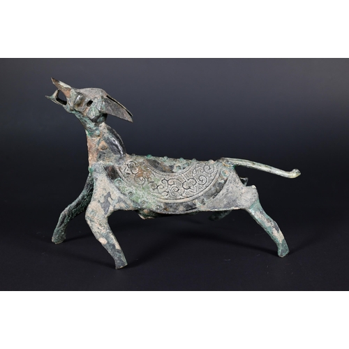 353 - An unusual Chinese bronze dog or mythical beast, possibly a tomb/funerary figure in the Han Dynasty ... 