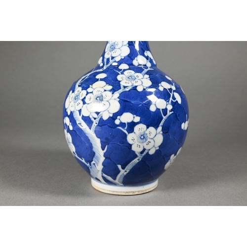 354 - A late 19th century Chinese blue and white globular vase, tianqiu ping, decorated with prunus on cra... 