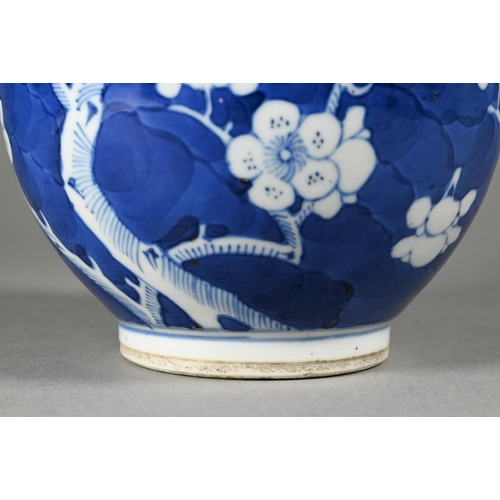 354 - A late 19th century Chinese blue and white globular vase, tianqiu ping, decorated with prunus on cra... 