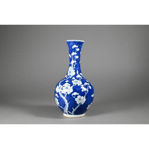 354 - A late 19th century Chinese blue and white globular vase, tianqiu ping, decorated with prunus on cra... 