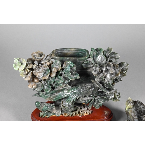 356 - A 20th century Chinese green hardstone vase and cover decoratively worked with various birds and flo... 