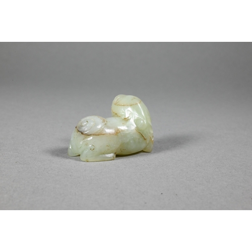 357 - A Chinese jade carving of a recumbent Buddhist lion, 6 cm w, to/w a smaller carved jade lion, 4.5 cm... 