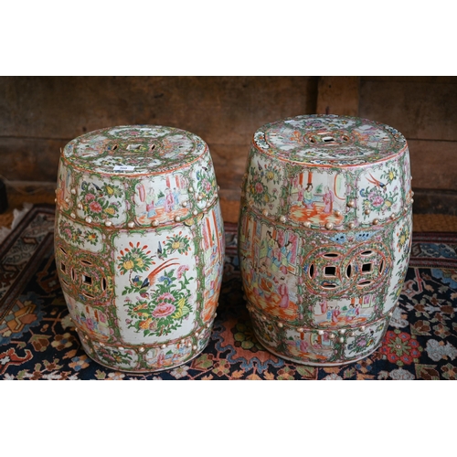 360 - A pair of 19th century Chinese Canton famille rose barrel form garden stools with pierced cash round... 