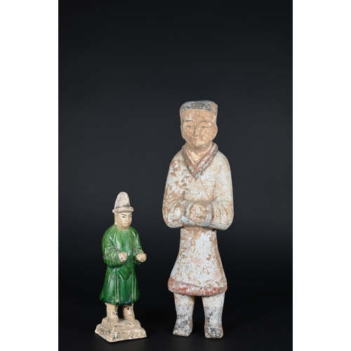 367 - A Chinese pottery funerary figure in the Han dynasty style, 32 cm high to/w to/w a Ming style green ... 