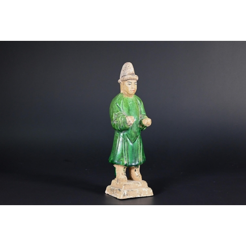 367 - A Chinese pottery funerary figure in the Han dynasty style, 32 cm high to/w to/w a Ming style green ... 