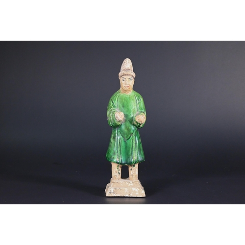 367 - A Chinese pottery funerary figure in the Han dynasty style, 32 cm high to/w to/w a Ming style green ... 