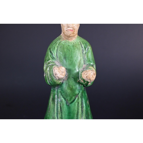 367 - A Chinese pottery funerary figure in the Han dynasty style, 32 cm high to/w to/w a Ming style green ... 