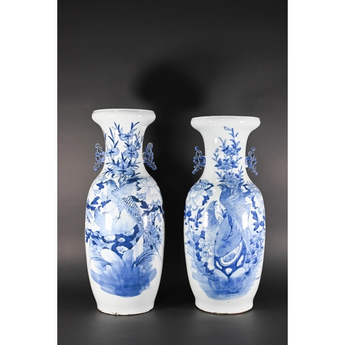 372 - A matched pair of large 19th century Chinese blue and white vases with applied archaistic handles, p... 