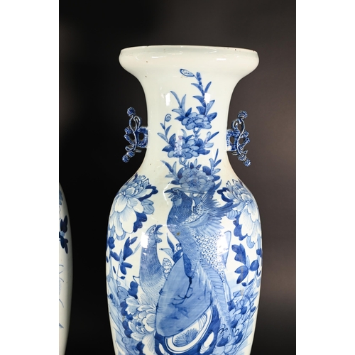 372 - A matched pair of large 19th century Chinese blue and white vases with applied archaistic handles, p... 