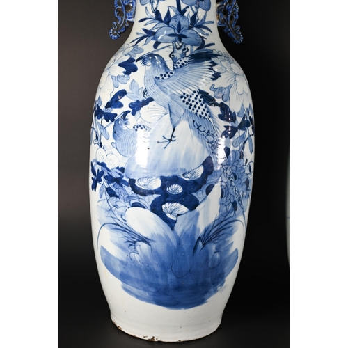 372 - A matched pair of large 19th century Chinese blue and white vases with applied archaistic handles, p... 