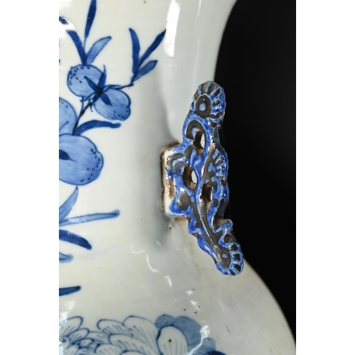 372 - A matched pair of large 19th century Chinese blue and white vases with applied archaistic handles, p... 