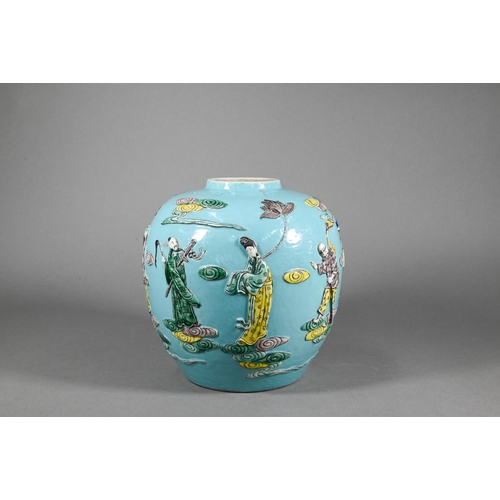 378 - A Chinese turquoise ginger jar decorated in relief with the eight Daoist immortals and related attri... 