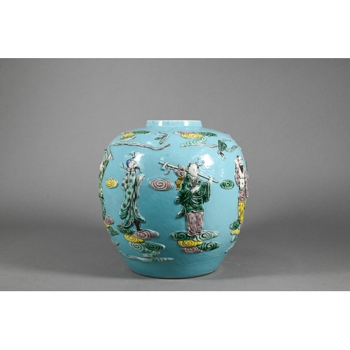 378 - A Chinese turquoise ginger jar decorated in relief with the eight Daoist immortals and related attri... 