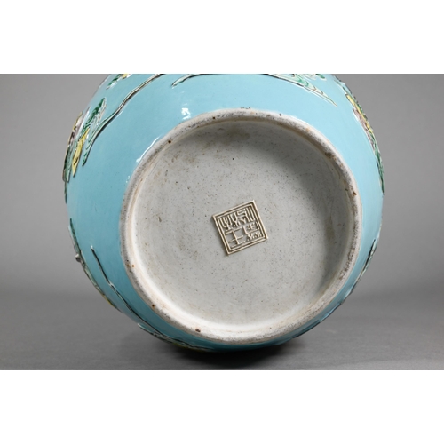 378 - A Chinese turquoise ginger jar decorated in relief with the eight Daoist immortals and related attri... 