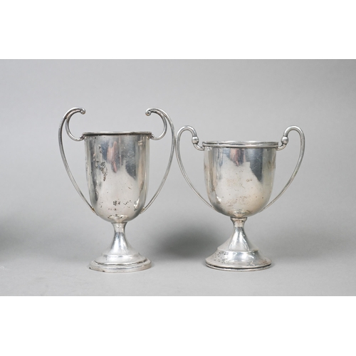 38 - Two silver trophy cups, 10.2oz, to/w three Indian Colonial cups stamped 'Orr Silver 23' and another ... 