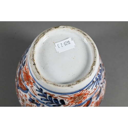 383 - A pair of 19th century Japanese Imari lidded lobed ovoid jars, Meji period, 29 cm high to/w a Samson... 