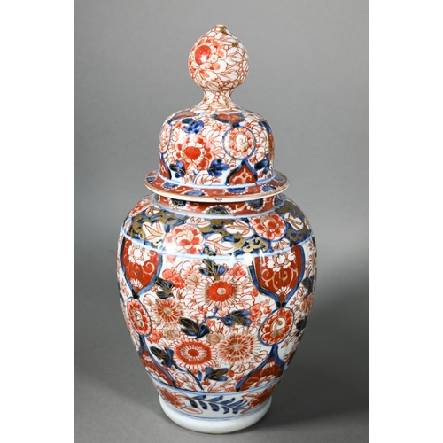 383 - A pair of 19th century Japanese Imari lidded lobed ovoid jars, Meji period, 29 cm high to/w a Samson... 