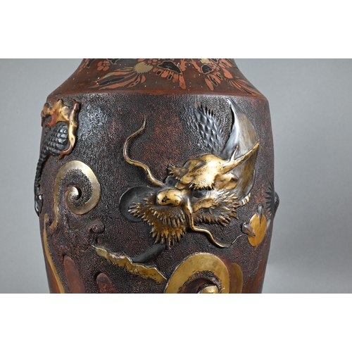 386 - A large early 20th century Japanese Tokoname redware vase decorated with a high relief and stippled ... 