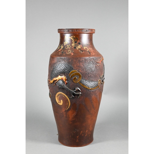 386 - A large early 20th century Japanese Tokoname redware vase decorated with a high relief and stippled ... 