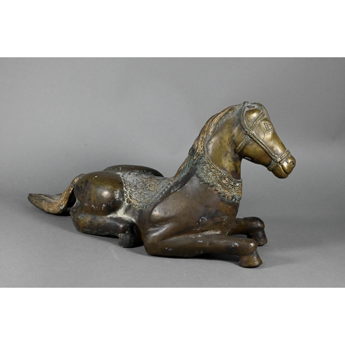 392 - A Chinese bronze recumbent horse sculpture (a/f) 50 cm w x 23 cm hMissing ears, splits to base... 